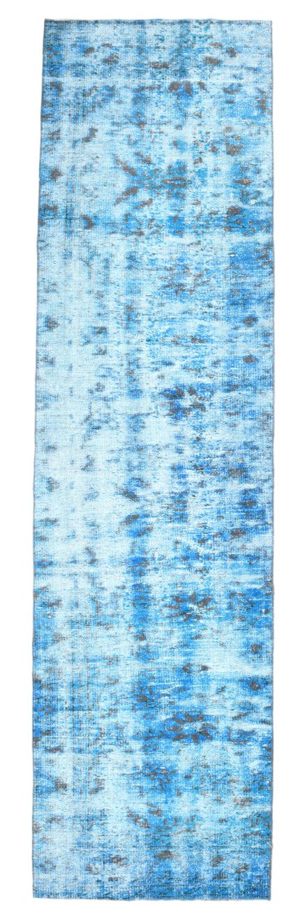 Blue patterned rug on a white background