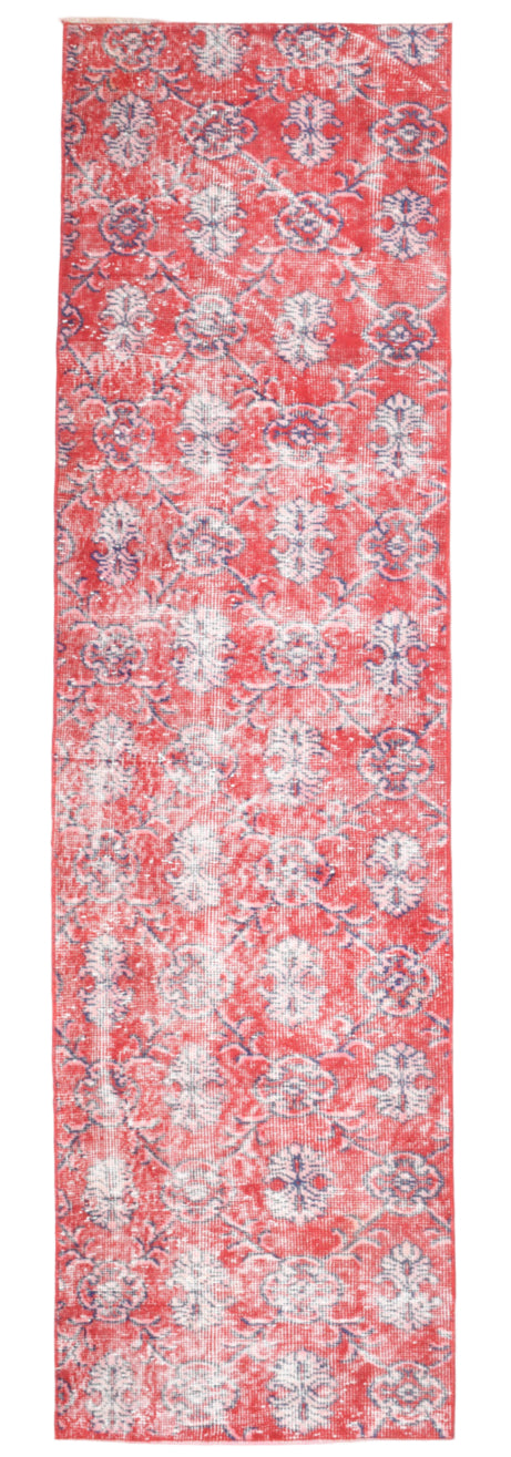 Red and white floral patterned rug