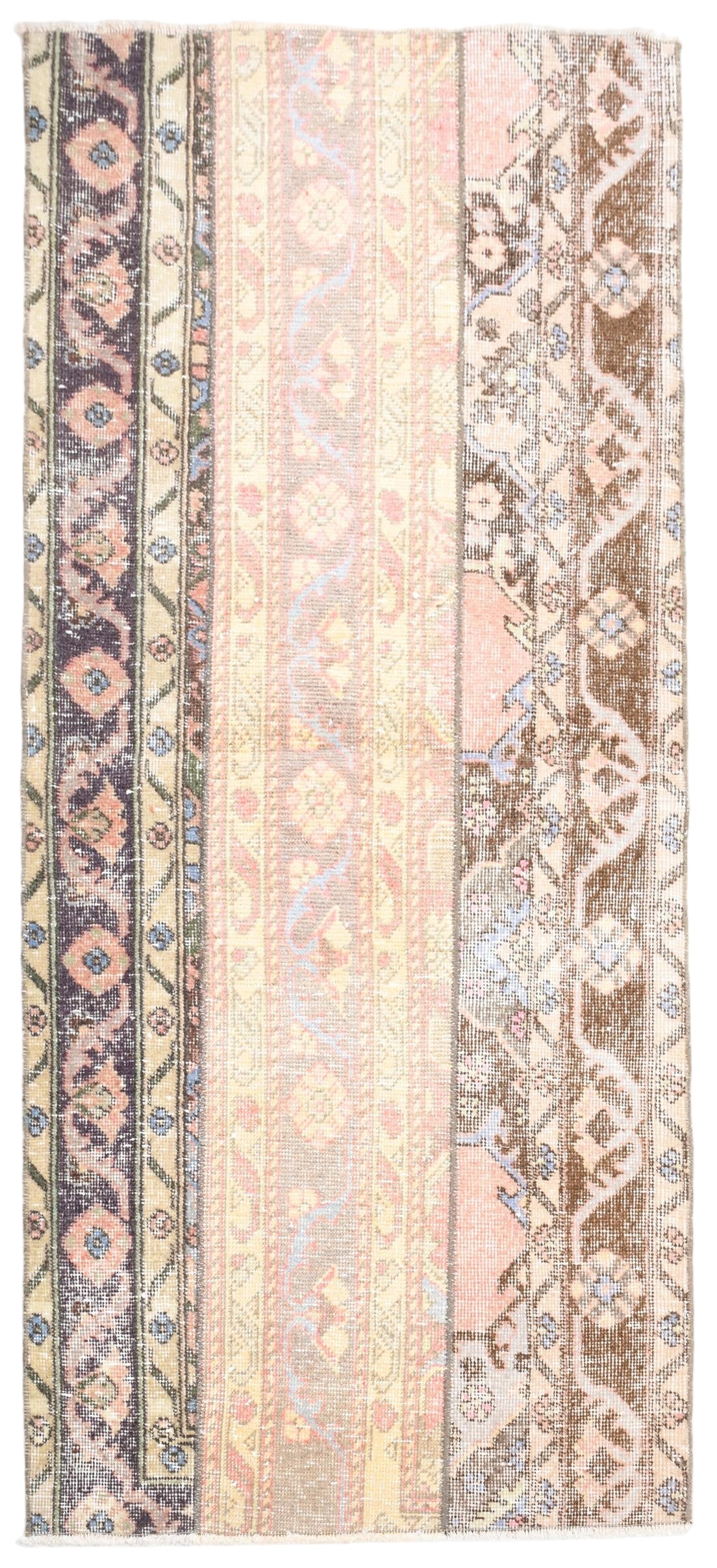 Decorative rug with intricate patterns in pastel colors