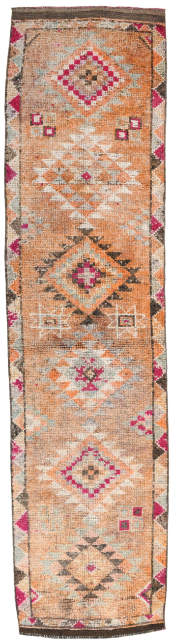 Decorative rug with geometric patterns on a plain background