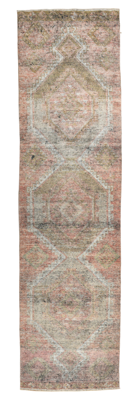 Decorative rug with geometric pattern on a white background