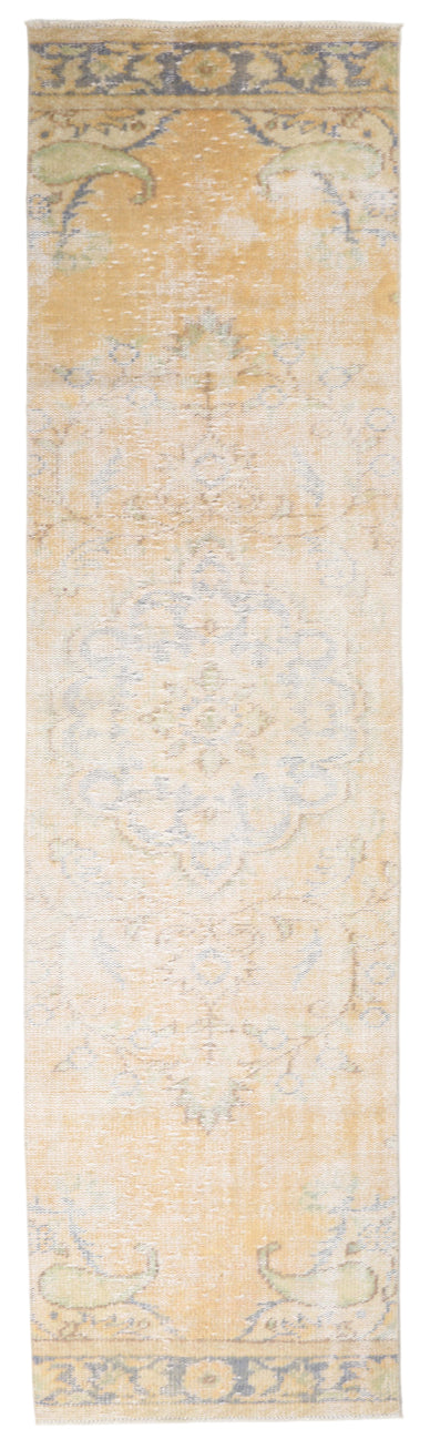 Long narrow rug with a floral pattern on a plain background