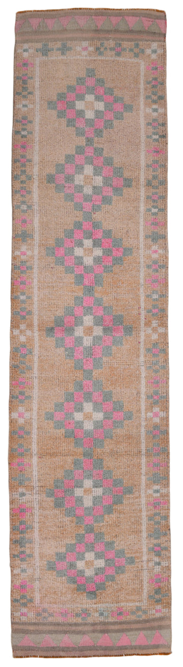 Traditional kilim rug with geometric pattern on a plain background
