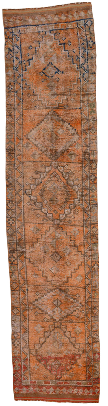 Vintage rug with geometric pattern on a white background