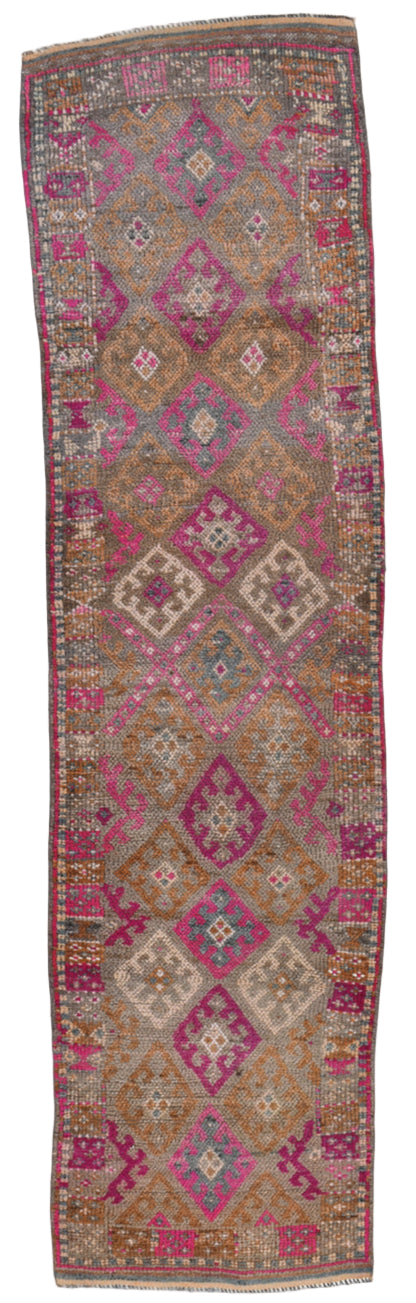 Traditional vintage herki rug with geometric pattern on a plain background