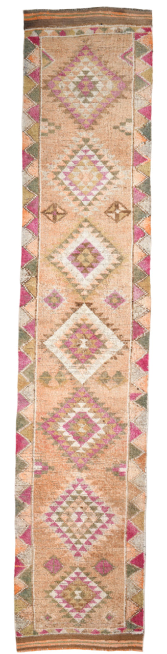 Decorative rug with geometric pattern on a plain background