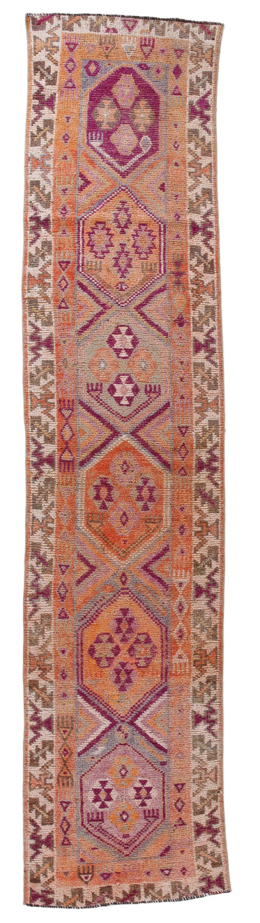 Decorative rug with geometric pattern on a white background