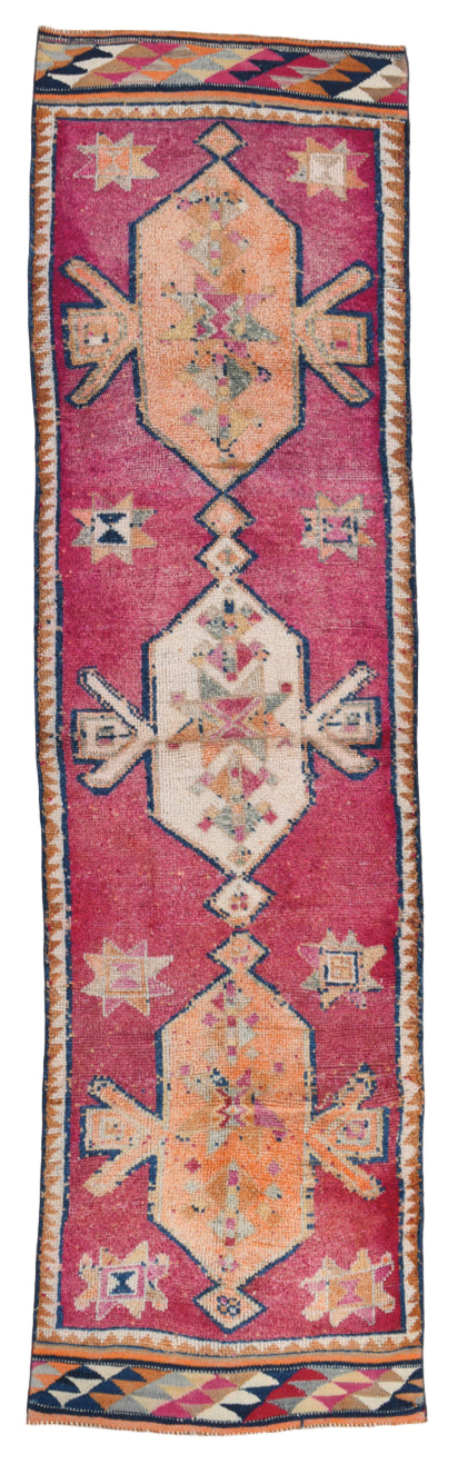 Decorative rug with geometric pattern on a plain background