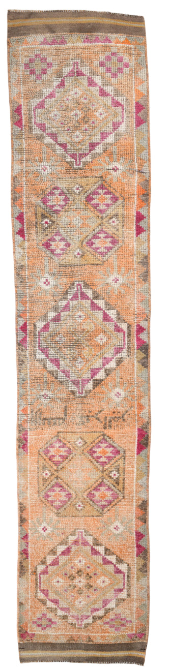 Decorative rug with geometric pattern on a white background