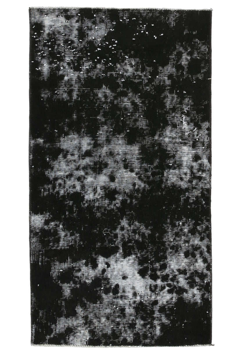 Textured black and gray rug with measurements on a white background
