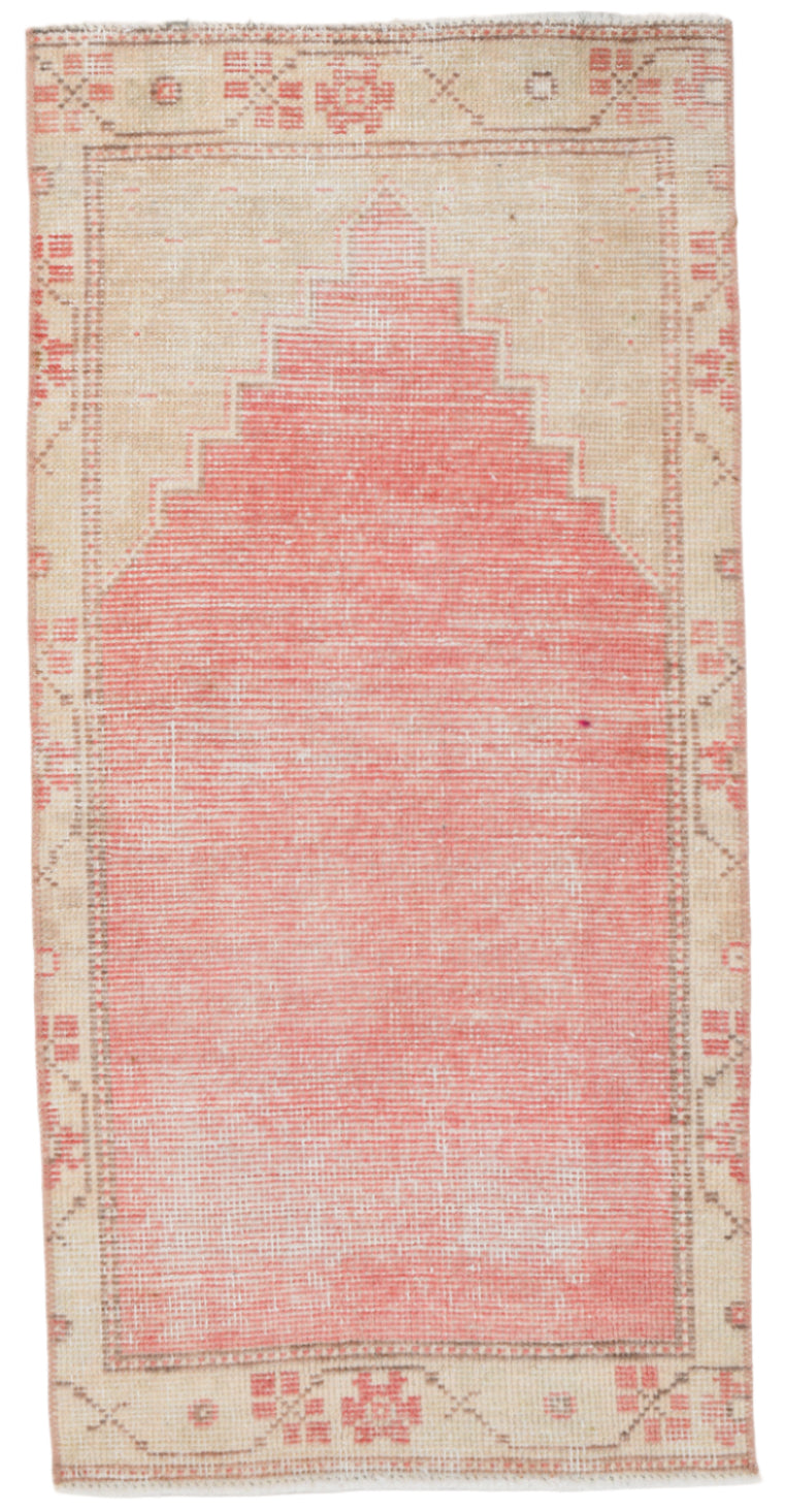 Rug with geometric design on a plain background