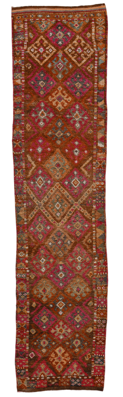 Traditional patterned fabric roll on a white background