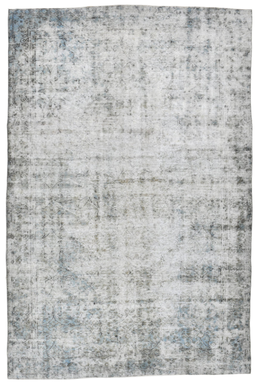 Textured area rug with a pattern on a plain background