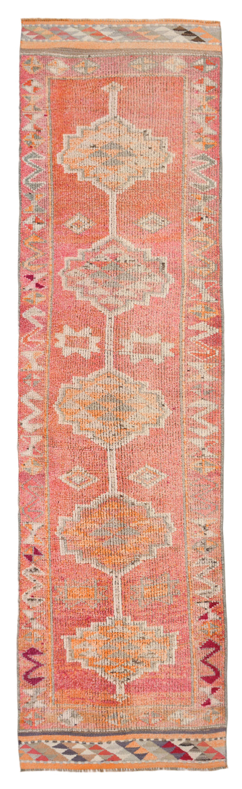 Decorative rug with geometric pattern on a plain background