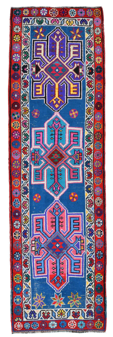 Decorative rug with intricate patterns on a blue background