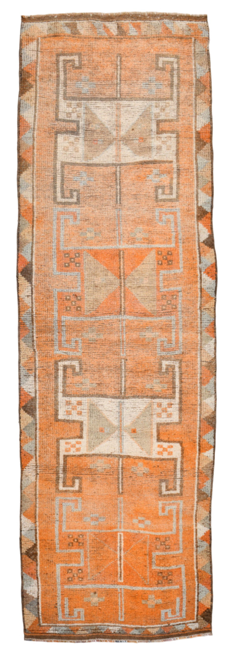 Textile with geometric pattern on a plain background