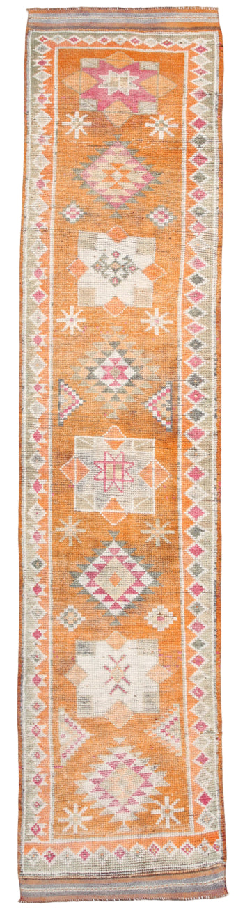 Decorative rug with geometric pattern on a plain background