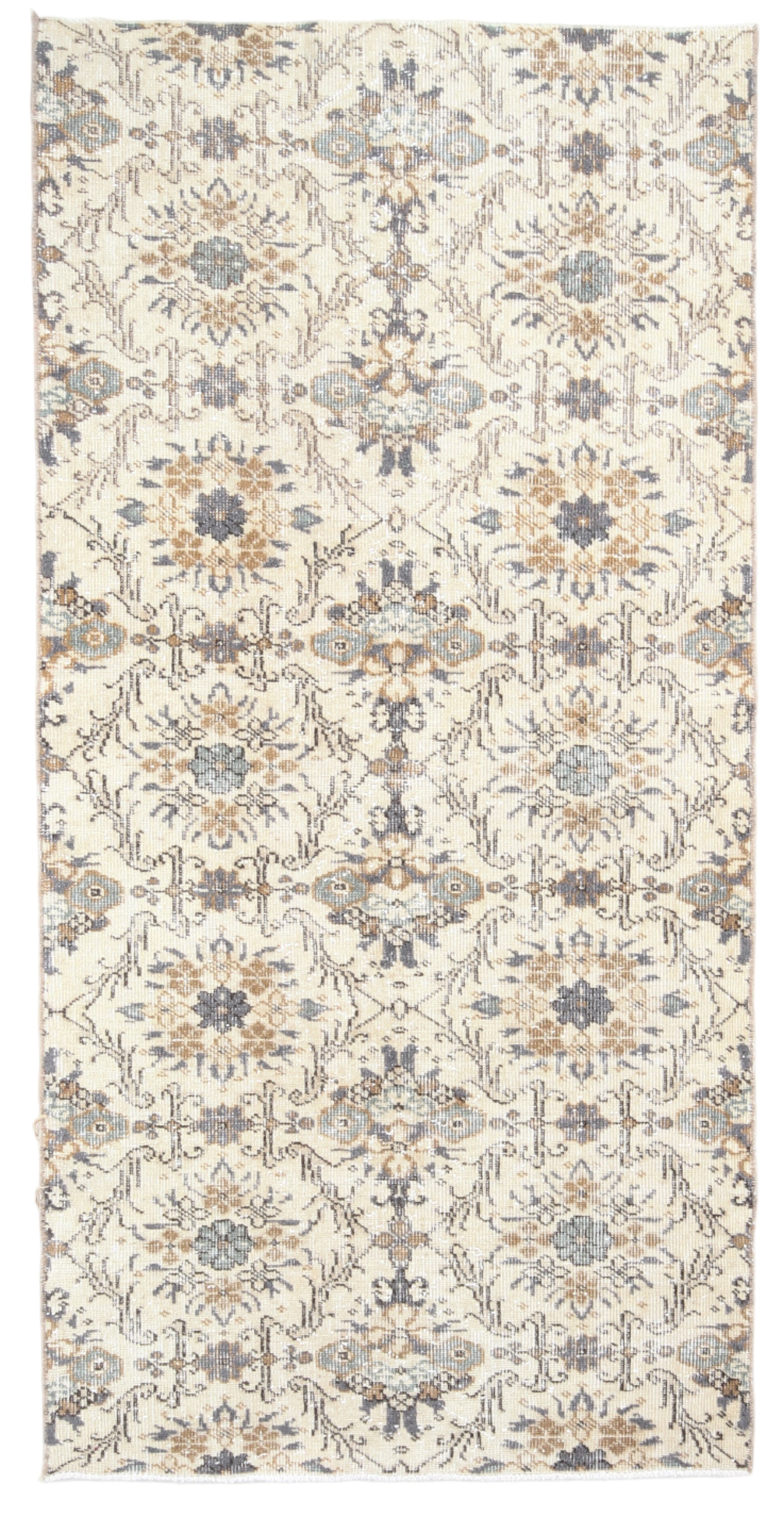 Patterned rug with geometric design on a white background