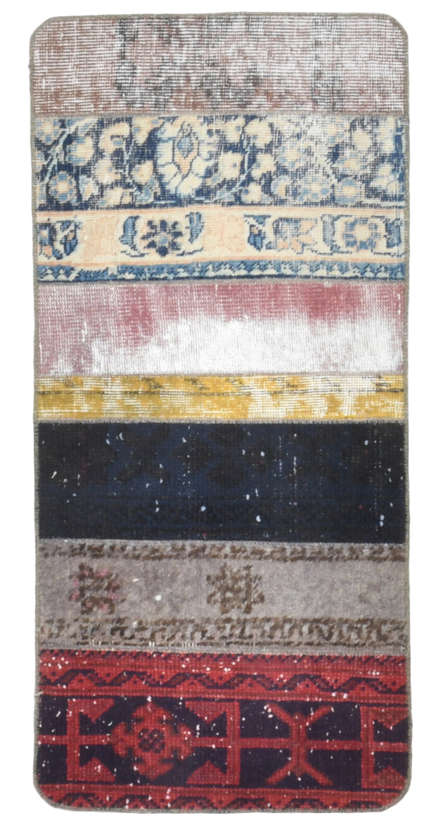 Multicolored patterned rug with geometric designs on a plain background