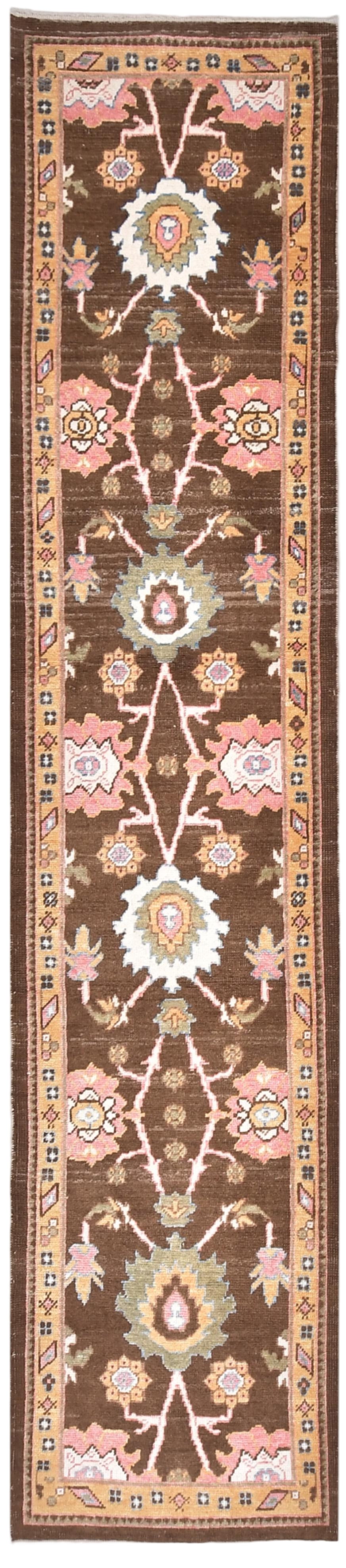 Decorative rug with intricate patterns on a brown background