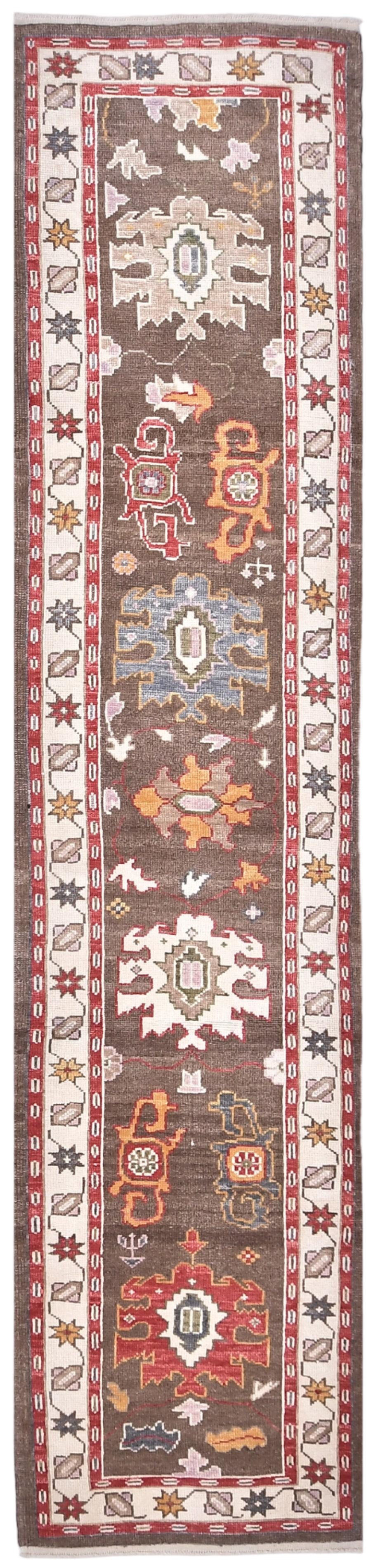 Decorative rug with intricate patterns on a brown background