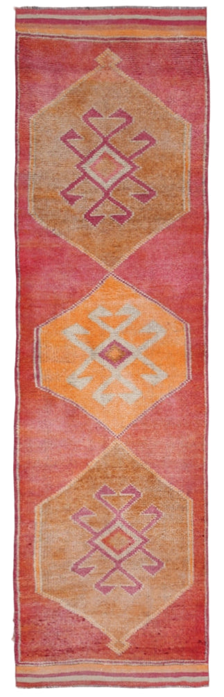 Decorative rug with geometric patterns on a plain background