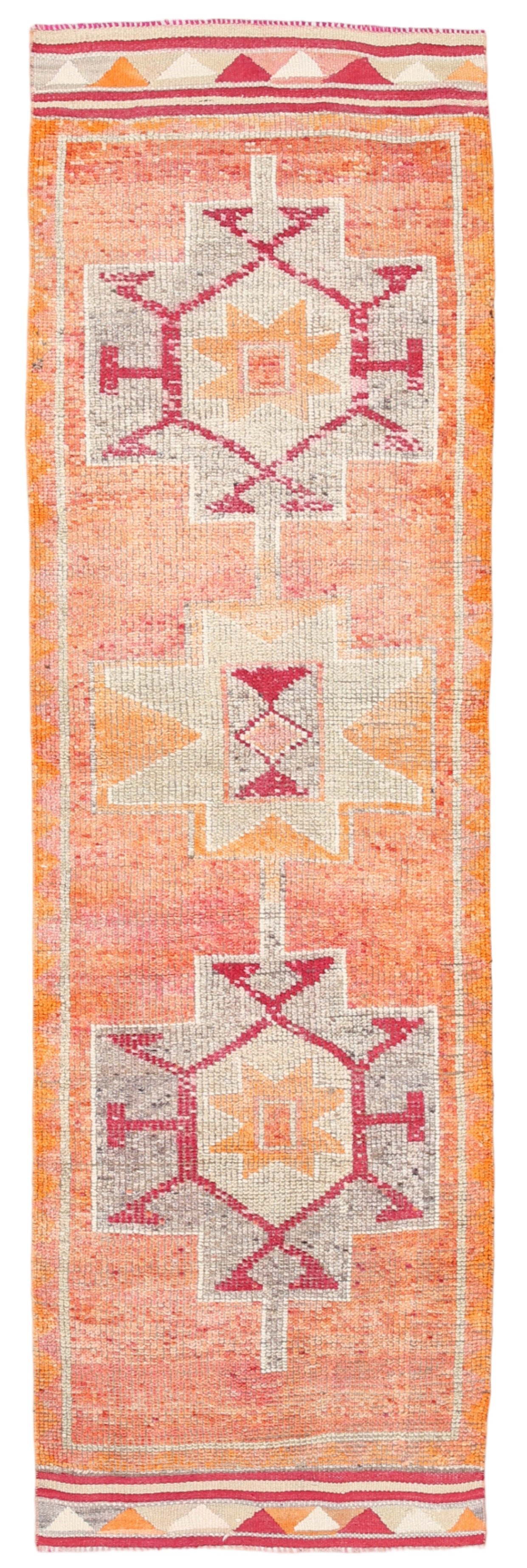 Decorative rug with geometric pattern on a white background