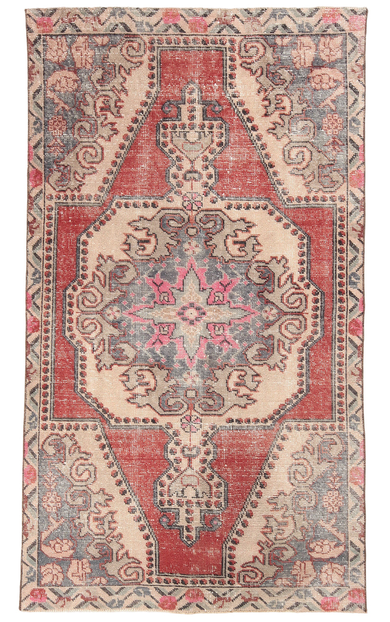 Decorative rug with intricate patterns on a plain background