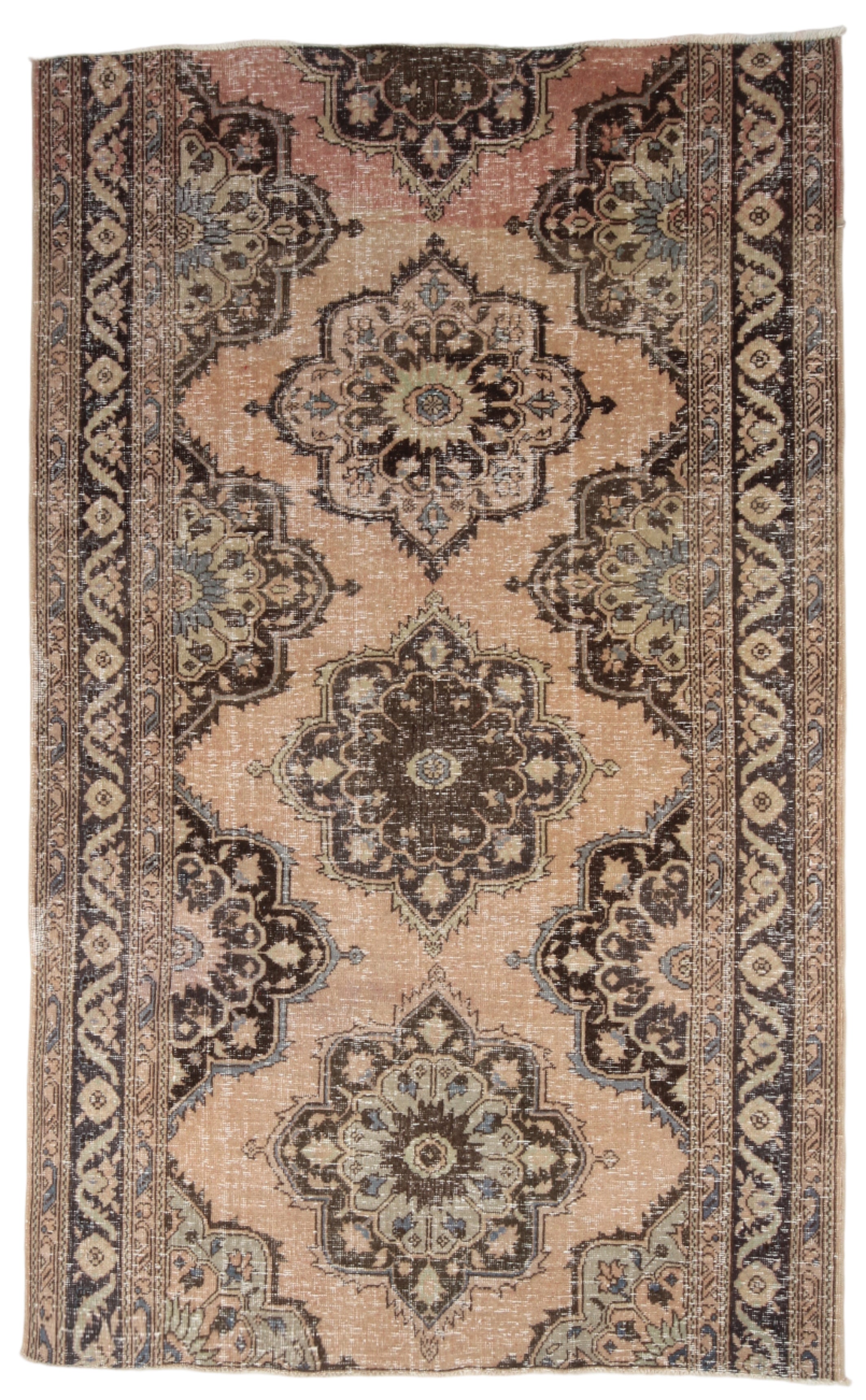 Decorative rug with intricate patterns on a plain background