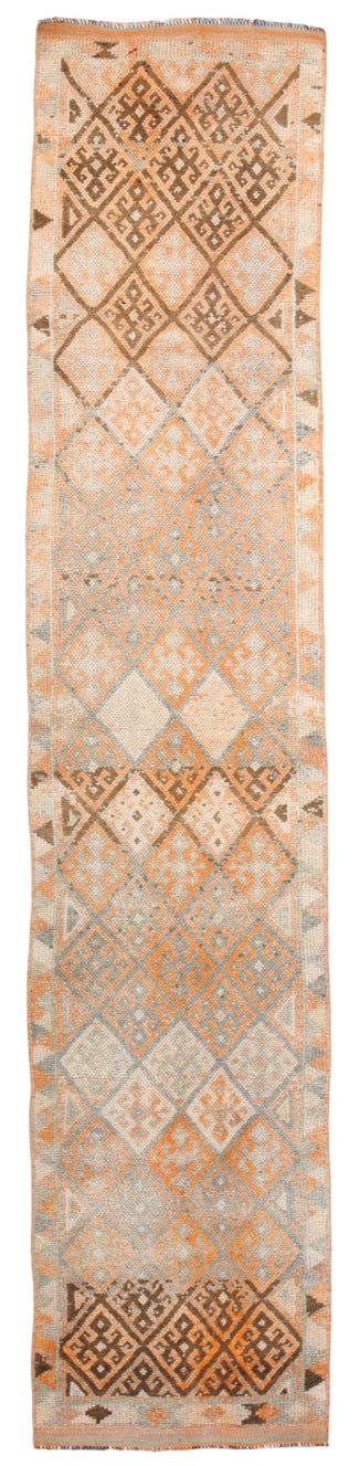 Textile with diamond pattern in shades of brown and beige