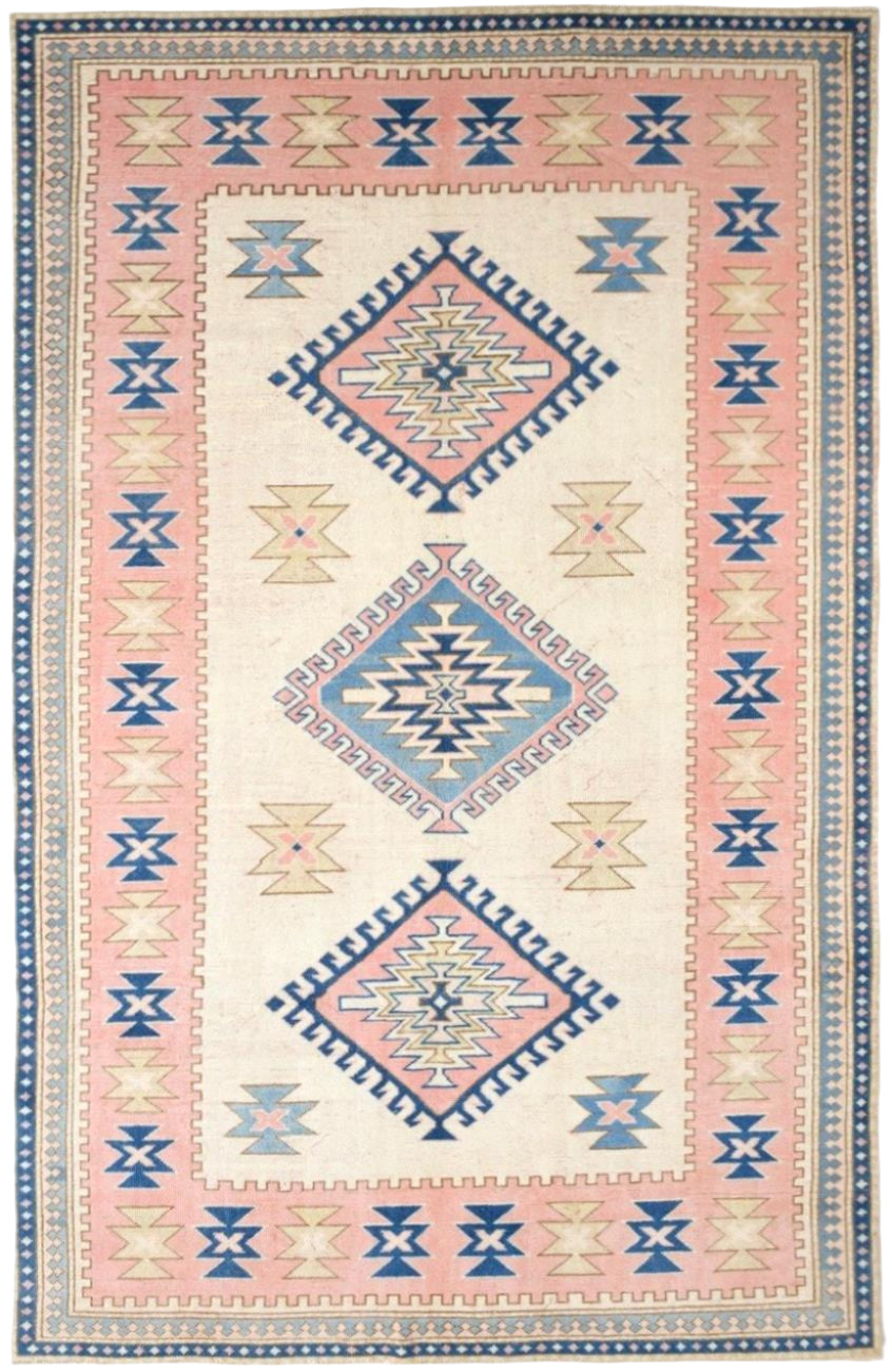 Decorative rug with geometric pattern on a pink background