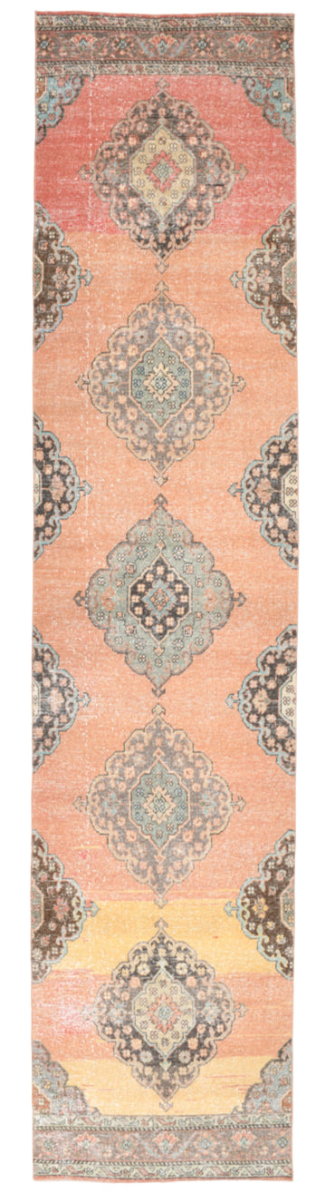 Patterned rug with geometric design on a plain background
