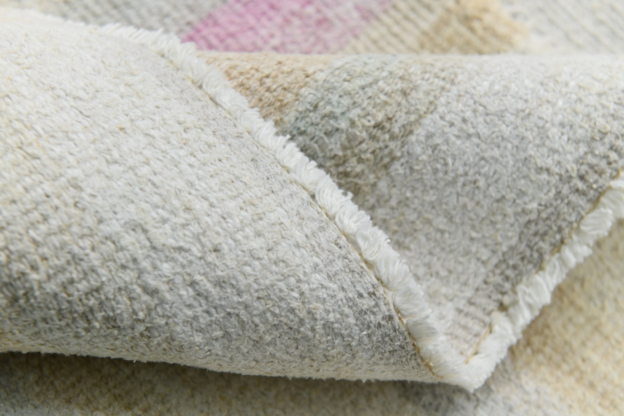 Close-up of a textured fabric with a checkered pattern