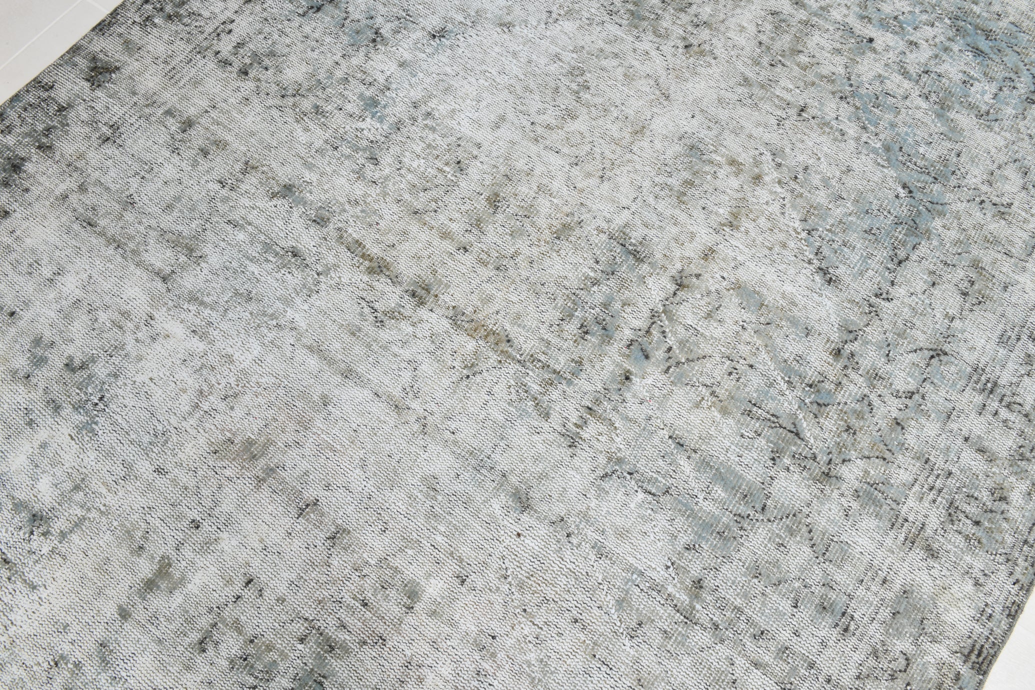 Close-up of a textured gray stone surface