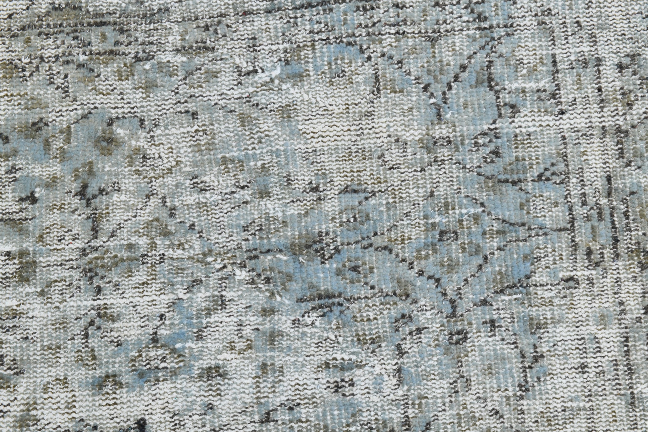 Close-up of a textured fabric with a subtle pattern